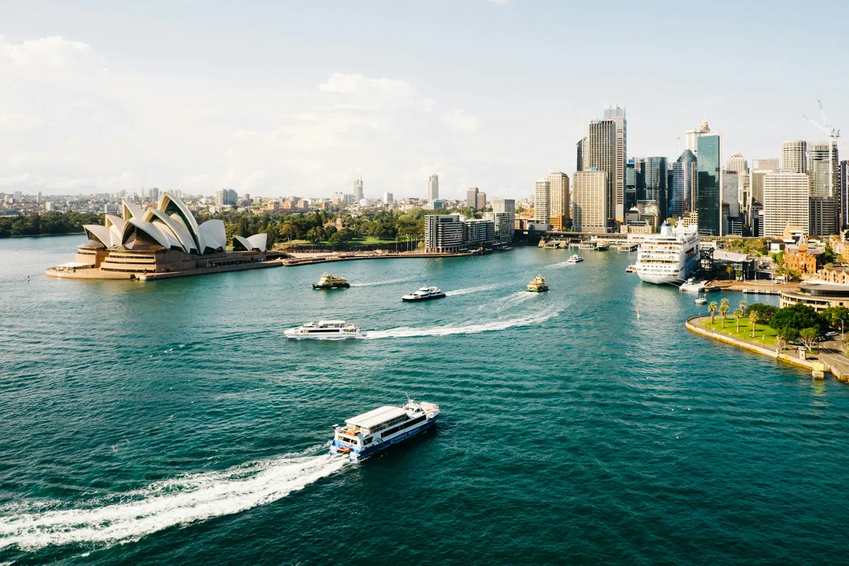Sydney Harbour with the Opera House and Circular Quay ferries - we deliver Australia-wide from Perth